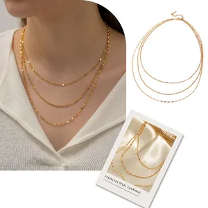 Three-layer 18K gold plated stainless steel necklace featuring sequins and rope chain
