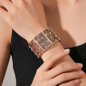 Vintage tricolor metal wide cuff bracelet with cutout patterns and sparkling rhinestones