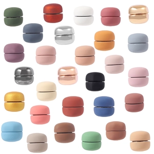 Colorful macaron magnetic scarf buckles in matte and metallic finishes on white background