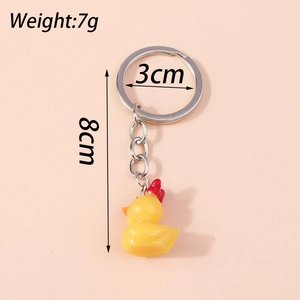 Detail showing 8cm yellow duck keychain with size and 7g weight measurements