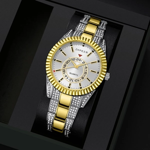 Luxury gold and silver men's watch with diamonds in a black premium gift box