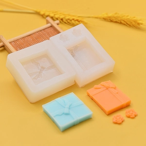 Bow gift box silicone mold for DIY fondant and resin crafts featuring bow relief texture