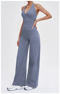 Detail view of high-waist wide-leg lounge pants and halter neck vest set in dusty blue