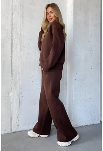 Side view of dark coffee lounge set featuring crewneck sweatshirt and wide-leg joggers