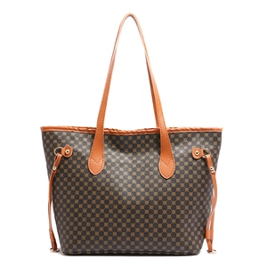 Large tote bag with geometric gold patterns and brown leather straps for commuting