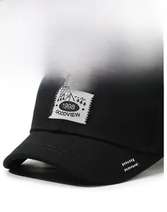 Detailed macro of a black cotton baseball cap featuring vintage 1998 embroidery and short brim
