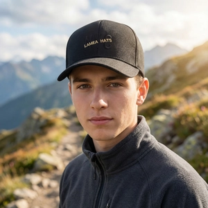 Classic black pineapple fabric baseball cap with LAMEA HATS embroidery in outdoor mountain setting