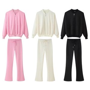 Women's 2-piece zip-up bomber jacket and flared pants set in pink, white, and black colors