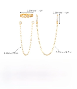Detail of gold chain earring set showing precise dimensions and polished copper texture
