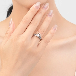 French vintage s925 silver crown ring set with sparkling diamonds on a model's hand