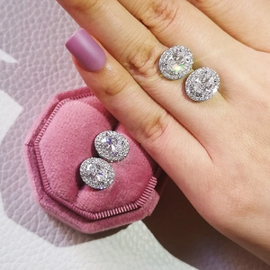 Oval halo stud earrings with clear zircon in pink velvet hexagonal jewelry box