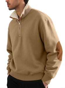 Detail view of khaki sweatshirt with sheepskin lining collar and brown elbow patches
