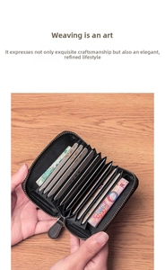 Detail of black woven leather card holder showing multi-slot accordion style interior space