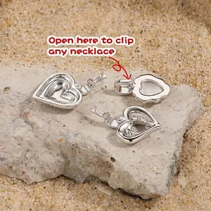 S925 sterling silver heart pendants with openable clasps on a natural stone background