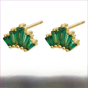 Detail view of gold-plated brass fan earrings with green baguette-cut cubic zirconia