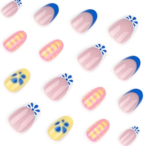 Short round fake nails set featuring blue French tips and floral patterns on white background