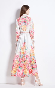 Back view of floral maxi dress with vibrant pink flowers and high mandarin collar