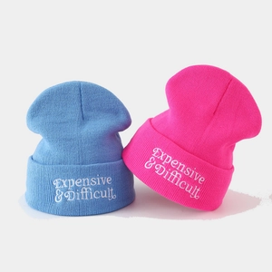 Knit beanie with Expensive & Difficult embroidery in light blue and bright pink styles