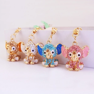 Colorful rhinestone elephant keychains in gold finish, set of four assorted colors