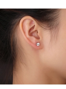Close-up of S925 sterling silver star stud earring with a brilliant round-cut zircon stone