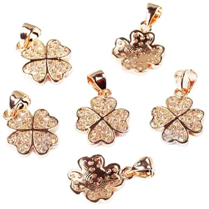 Rose gold four-leaf clover pendant set with pavé white zircons and polished back