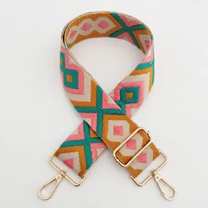 Adjustable geometric jacquard embroidered shoulder strap with gold metal lobster clasps