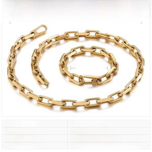 Detailed view of gold stainless steel paperclip chain set with product dimensions