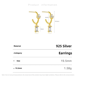 Detail view of 925 silver J-shaped earrings featuring zircons and rectangle crystal drop