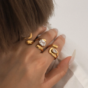 Elegant gold-plated stainless steel open rings with zircon stones on female fingers