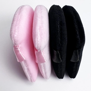 Set of four ultra-soft velvet triangle powder puffs in pink and black with ribbon handle