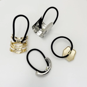 Minimalist alloy hair ties set in gold and silver metallic styles on black elastic bands