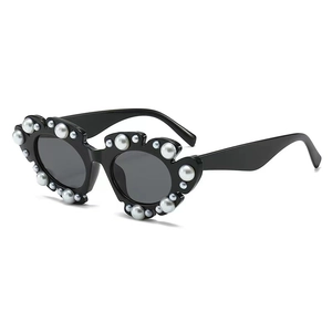 Fashionable black thick-frame sunglasses with elegant white pearls for women's party wear