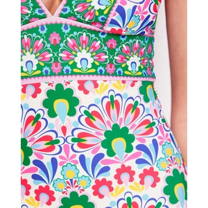 Women's modest one-piece swimsuit with bohemian floral print and V-neckline detail