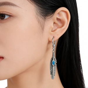 Orecchini a piuma in argento vintage con intarsio in pietra di turchese blu chic