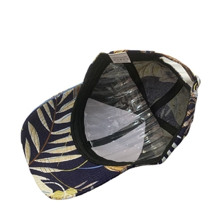 Tropical leaf print baseball cap in dark blue, interior view with reinforcement detail