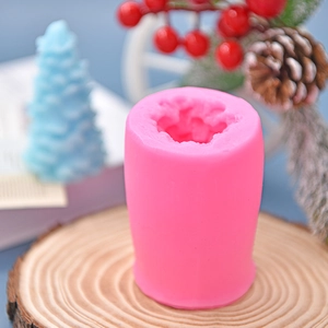 Pink Christmas tree silicone mold for DIY candles and cakes on rustic wood base