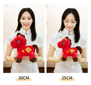 Comparison of 25cm and 30cm plush Year of the Horse mascot toys held by model