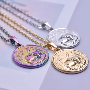 Three round stainless steel necklaces with fox designs in gold, silver, and rainbow finishes