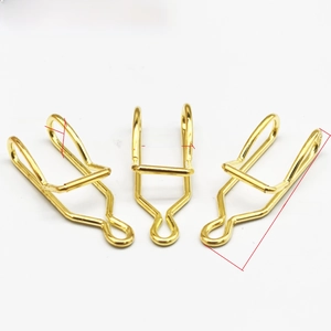 Detailed macro view of 38mm golden alloy lobster clasps with dimensions for DIY jewelry