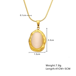 Golden stainless steel necklace featuring an oval cat-eye stone pendant on a white background