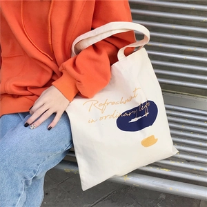 Minimalist canvas tote bag with abstract color blocks and Refreshment art lettering