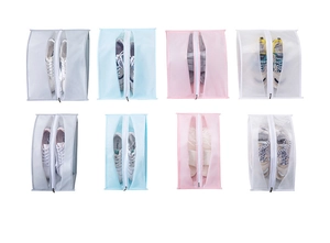 Waterproof travel shoe bags in grey, blue, pink and white with two size options