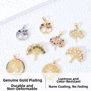 Detail of colorful tree of life pendants with gold plating and multicolor cubic zirconia