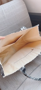 Interior view of tiger tote bag showing spacious lining with zipper and slip pockets