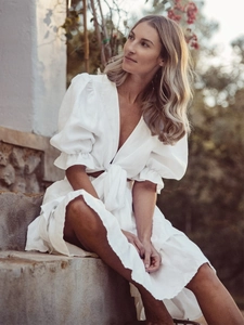White puff sleeve tie-up top and tiered skirt set in breathable cotton linen style