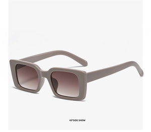 Detailed 45-degree side view of taupe square sunglasses with gradient brown lenses