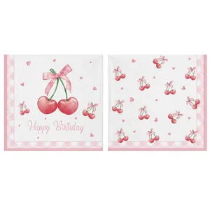 Detail view of cherry themed birthday napkins featuring watercolor patterns and pink bows