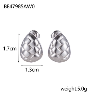 Detailed macro of silver teardrop earrings with woven texture, 1.7cm height and 1.3cm width