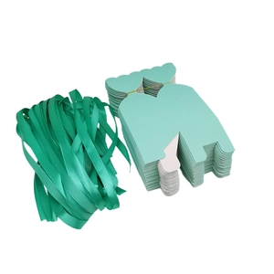 Flat pack of mint green striped candy gift boxes with matching satin ribbons