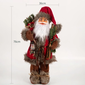 Standing Santa Claus figure with lantern and pine needles, dimensions 76cm by 36cm